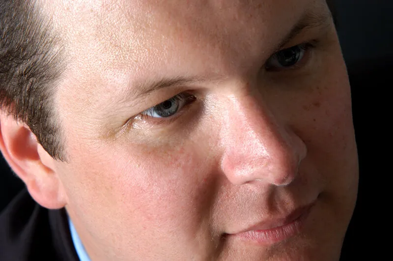 Portrait of Nathan Buzza.